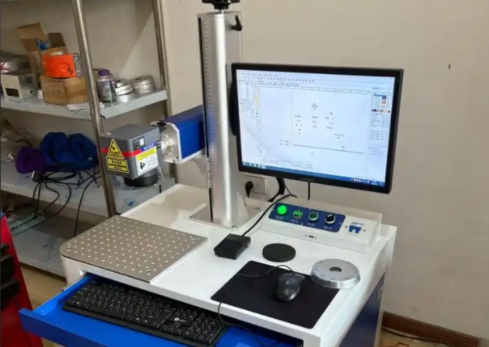 紫外激光打標機在塑料按鈕加工中的應用